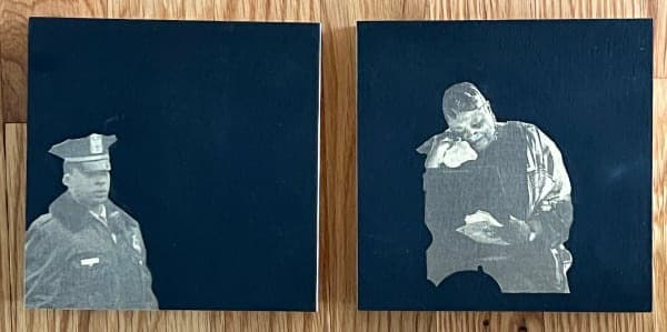 Two square black panels with greyscale figures of a police officer and a seated man reading.
